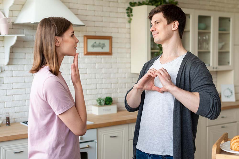  couple talking sign language